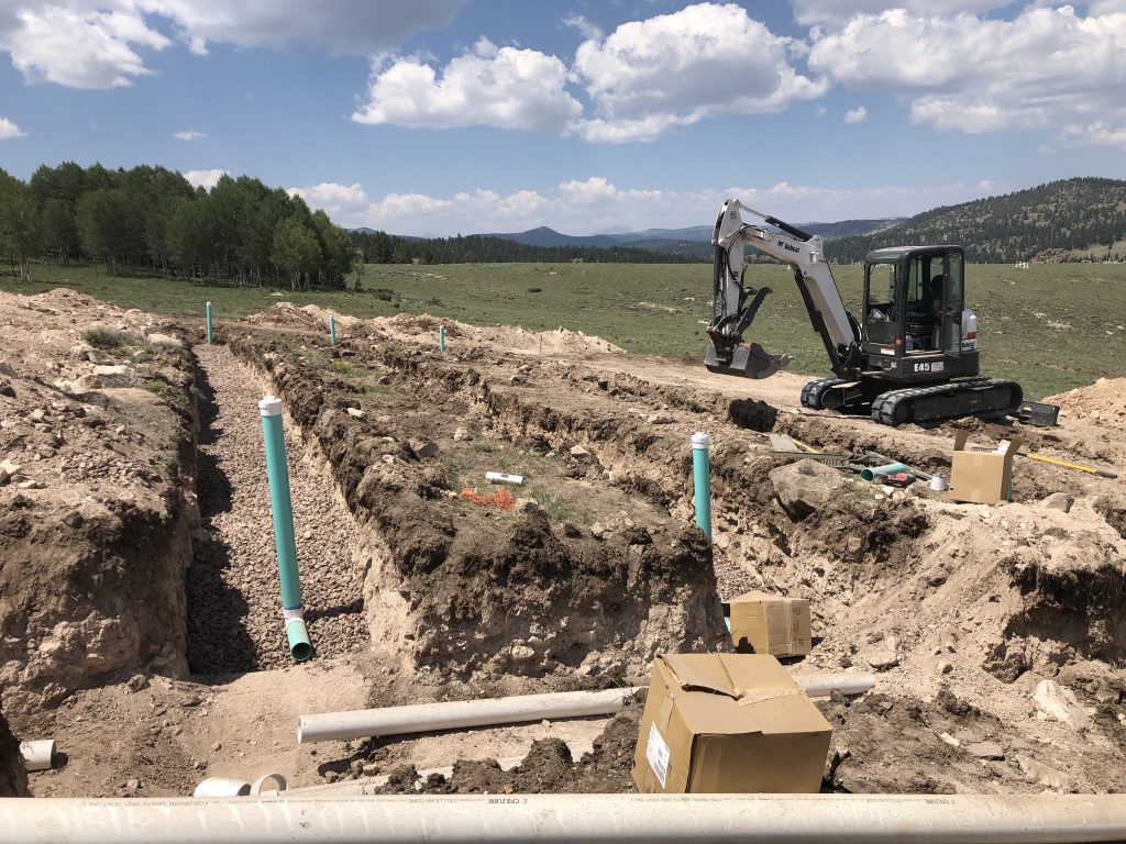 Septic system for a mixed use barn with residence above - Rustic ...